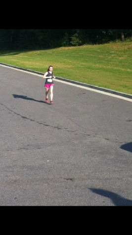 Me running my first 5k as a sophomore... You can't really tell from this picture but I was definitely suffering. 