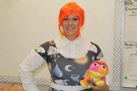Teachers dressed up in elaborate costumes to show students even they can have fun during school. Mrs. Horn is dressed as Mrs. Frizzle from the Magic School Bus.