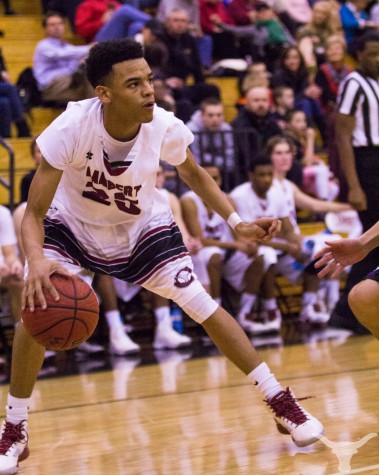 Jordan McIlwain looks to make a play. The Longhorns topped MIlton on Saturday.