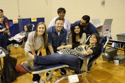 Students offer support for Ms. Horn as she donates blood.