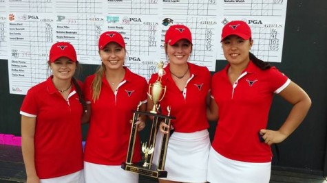 Low scorers posing with their first-place trophy at the West Hall Invitational. From left: Kate Owens, Lauren Lauren Lightfritz, Kayley Marschke, and Tiffany Kang.