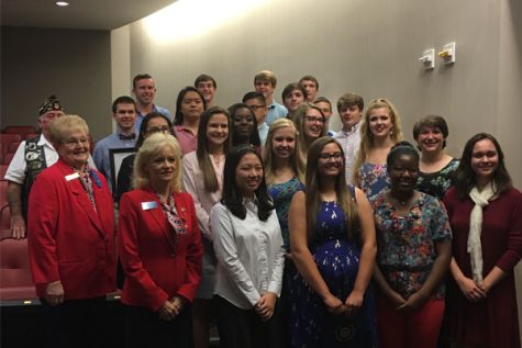 The Boys & Girls State participants along with leaders of the American Legion & Auxiliary pose for a group picture.