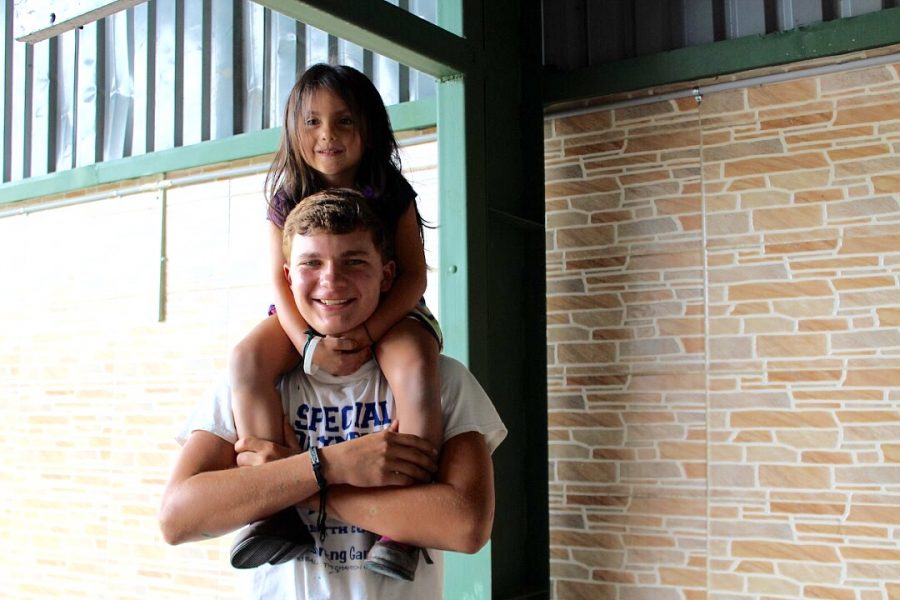 Milena sits on my shoulders on the last day at the school, right before we said goodbye.