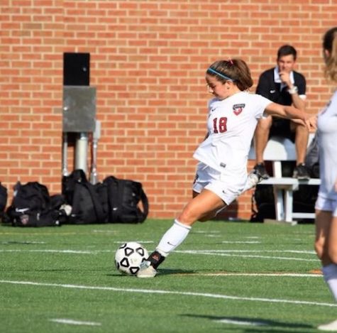 Maddie ready to kick the ball.