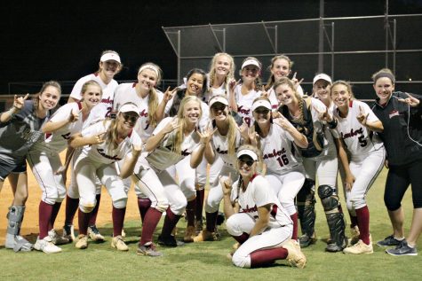 Lady Horns showing their pride and excitement with the signature “Hook ‘Em” gesture. Photo used by permission from Nancy Aledia.
