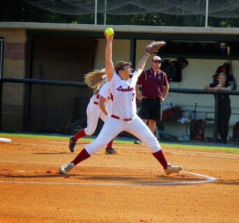 Marissa pitching for the Lambert Longhorns.