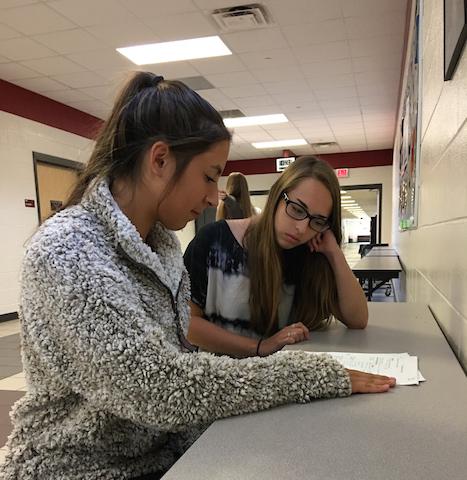 Beta Club member Brenna Reilly tutors Madison Powers in order to receive service hours.