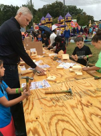 Adults and students alike can create wood structures such as birdhouses at this table.