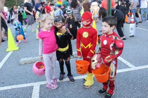 The moms tried numerous times to capture the attention of these cute elementary schoolers. As you can tell, they weren't very interested as crowds of people in costumes encircled them.