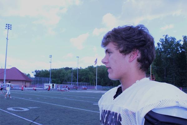 Tyler observing his team at practice on a Wednesday afternoon.