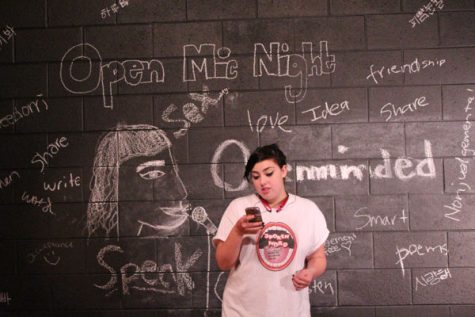 Spoken Word Club Vice President Brianna La Rocca recites a Spoken Word piece by Prince Ea, titled