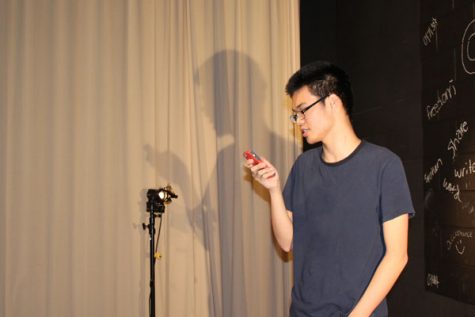 Sophomore Eric Zhu recites an original poem called "The Easy Way Out".