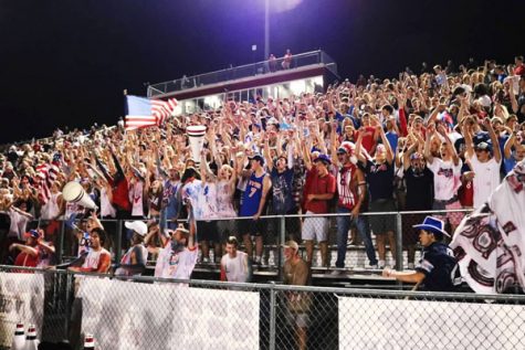 Lambert students showing their pride at the homecoming game