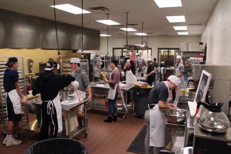 The hustle and bustle of a kitchen can not be ignored. To some one that's never witnessed what goes on in Lambert's Culinary Arts class they might call it chaos, but that's not true. There's an organization to it; everyone has a purpose and knows what they're doing. Everything comes together to make the perfect dish.