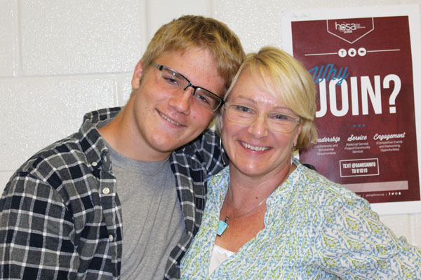 Junior David Standeven and Dr. Janet Standeven, his mom and his biotech teacher, share a very close bond. They both shared how David would pop in during the day to say hello and give a hug. Dr. Standeven explained further that they have a signal in case she cannot be disturbed during a particular class period. 