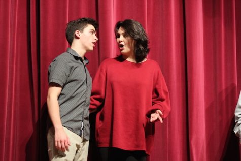 Dean Mckenzie and Hanah Feinstein collaborate to finish their improv act.