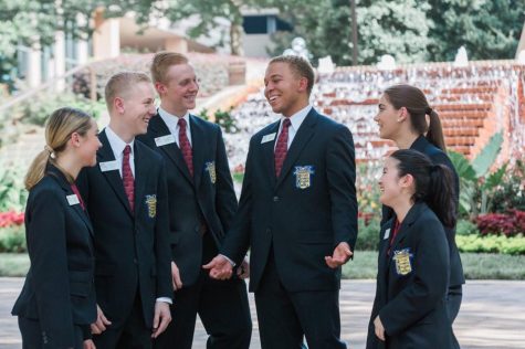 Lambert student Royce Dickerson laughing with the other FBLA Georgia State officers, (from left to right) state reporter Macy McKinely, state projects vice president Mathew McDaniel, state membership vice president Nick Loudermilk, state president Royce Dickerson, state parliamentarian Catherine Farist, and state secretary Shelly Ling.