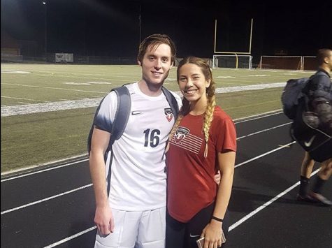Grant Plaugher stands with fellow senior soccer player Maddie Eddleman after a Lambert region victory (photo used with permission from Grant Plaugher)