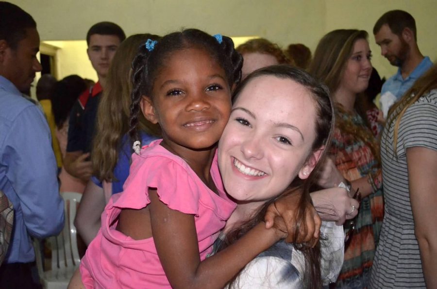 Anna Brook posing with one of the girls from the church, Crystel. 