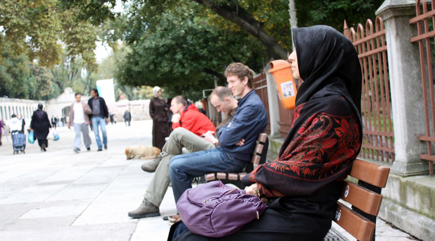 Photo by Frank van Leersum , Taken October 28, 2009 , Link to license: https://creativecommons.org/licenses/by/2.0/legalcode , Link to original work: https://www.flickr.com/photos/frankvanleersum/4212500317/in/photolist-7qfazP-dcx3S7-dCnsU2-jKvLGm-dCnsRP-gTym8G-dCnt3g-gTybsh-gTyEBU-4gia8f-gTyvmb-gTxYf2-gTyPAL-3G97N8-kJGUJi-BVMyqe-gTwJeM-4EEPX-gTwuSh-gTywij-gTyYhy-gTzK4r-gTyBEb-9345aZ-gTvZd9-gTz3em-gTzagr-gTy2K9-dCnsKD-gTy7ZC-gTwMuK-gTyuzP-gTx3Kr-gTyRVf-gTxDho-6Fqkkh-TkBCrL-dH1qLR-9FHjH-gTy6p1-gTz1Ay-gTx2pj-gTw6XE-dCsTwq-gTyMoj-gTyZwu-gTzbC4-T3b9CG-gTy46W-gTysa8 , Muslim woman sits alone on a bench She represents one of the billions of peaceful Muslims in the world.