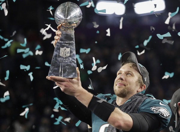Philadelphia Eagles Nick Foles holds up the Vince Lombardi Trophy after the NFL Super Bowl 52 football game against the New England Patriots Sunday, Feb. 4, 2018, in Minneapolis. The Eagles won 41-33. (AP Photo/Matt Slocum)