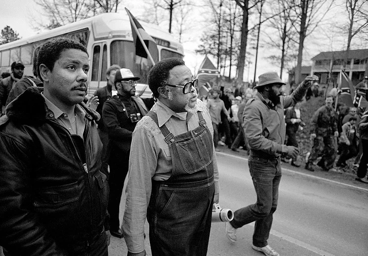 Hosea Williams leading the first march on Cumming celebrating the anniversary of Dr. King’s birthday, January 17th, 1987. Photo by Gene Blythe/AP.
