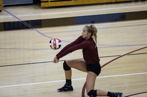 Nelson set a ball for the Lambert team in a home game during the 2020 season last year. Nelson was a junior at the time and still looked to commit to a college to continue her volleyball career. (Lambert Volleyball/…)
