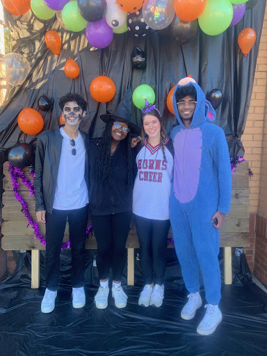 Pictures from left to right Saif Khan, Cassie Lingashi, Emily Haskins and Aditya Prabhakar at Lambert Trunk or Treat event. October 23, 2021. School spirit fun. (Stephanie Tighe) 
