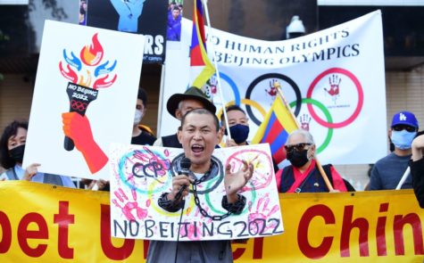 Chinese protestors to stop the 2022 Winter Olympics in Beijing, China. December 6, 2021. The U.S. has announced they will not be sending official delegation to Beijing for the Olympics. (Frederic J. Brown/@americanpost) 
