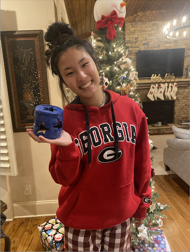 A Picture of Olivia holding her sculpture., Friday December 17, 2021. (The Lambert Post/Olivia Deveraux)