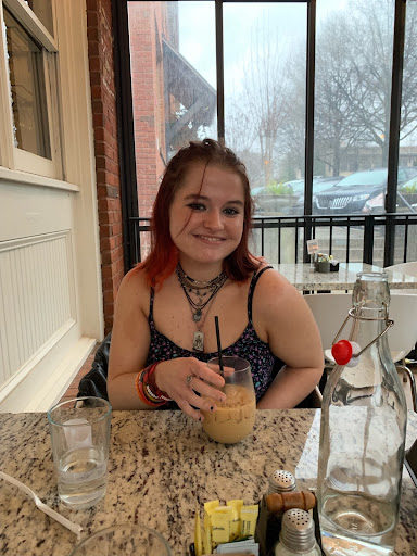 Libby Mangum drinking coffee at Nido Cafe in Cumming, Georgia. December 18, 2021. (Taken by Kiersten Krupit)
