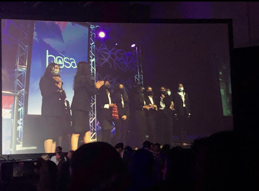 The picture above are Lambert students accepting their awards during the HOSA SLC: Manasvi Gupta and Sahara.