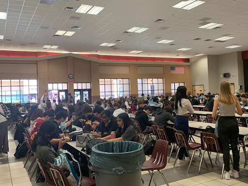 This is an image of students at the cafeteria enjoying lunch and learning. April 20, 2022. Lunch and Learn was invented by Lambert eight years ago and is still in place today. (Shriya Buche) 