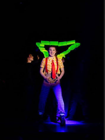 Maddie Ross playing Spongebob in the musical on February 27, 2022. 
Taken by Patrick Marcigliano, https://www.marciglianophoto.com
