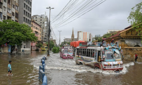 A central Karachi street on Monday after heavy monsoon rains wreaked chaos across Pakistan. Photograph: Anadolu Agency/Getty Images