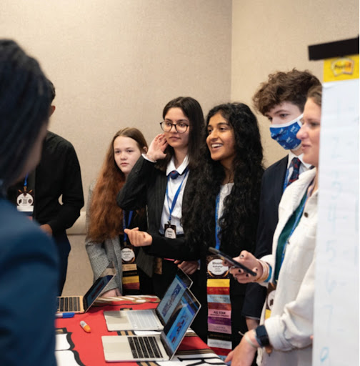 Photo of Bhoomi Kotharkar at a leadership workshop at the State Leadership Conference. Taken by Tyler Schott, March 11 2022. Bhoomi is networking with students all over the country.