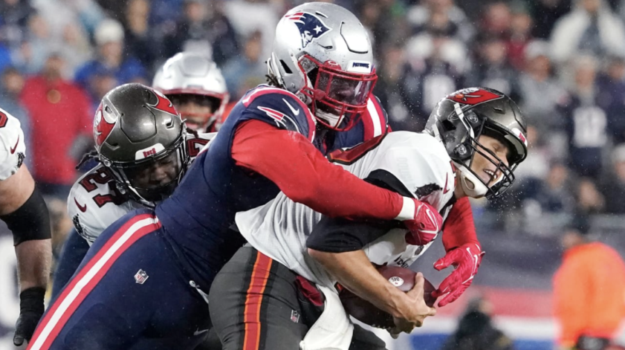 Tom Brady getting sacked by New England Patriots linebacker Matthew Judon (October 4, 2021). Brady has suffered 3 consecutive losses, the first time since 2002. Photo courtesy of the NFL.