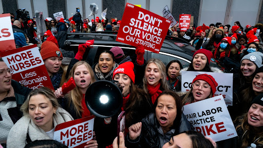 After hours of failed discussions, nurses conduct a walkout in front of the Mt. Sinai Hospital in the Manhattan borough of New York on January 9, 2023. (AP Photo/Craig Ruttle)