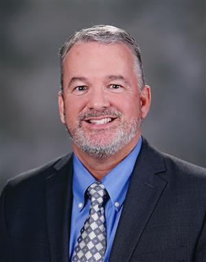 Staff picture of Dr. Jeff Bearden, taken in 2022, courtesy of Forsyth County Schools website