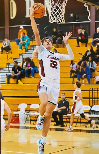  Photo of Jack Whipple playing his favorite sport, basketball. Photo credits to Jack Whipple (December 2022).