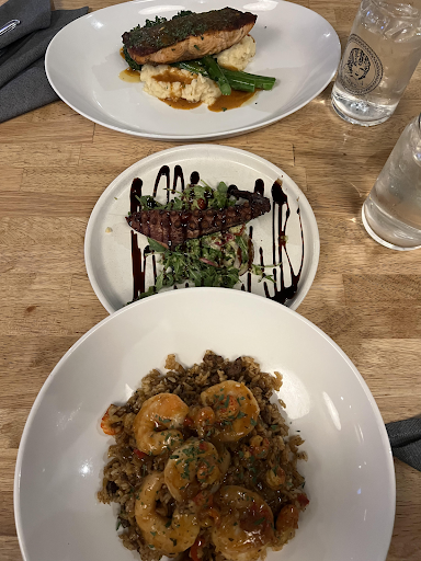 The blackened salmon at the top, octopus leg in the middle and shrimp etouffee at the bottom. Photo taken by Wonhyung Nathan Kim on January 14, 2023.