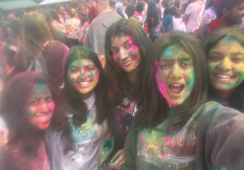 An image of Manasvi Gupta at the Cumming Fairgrounds’ Holi celebration with her friends. More than 15,000 people celebrated with Sewa. Taken by Shriya Buche on March 11, 2023