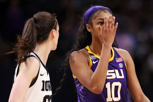 Angel Reese flaunting the “You can’t see me” gesture to Caitlin Clark following LSU’s victory over Iowa in the NCAA women’s tournament on April 2, 2023.  Courtesy of Maddie Meyer/Getty Images.