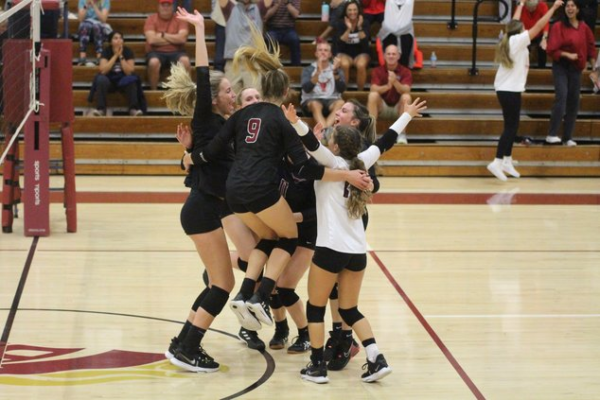 Lambert Volleyball team celebrates their win against Brookwood in the Quarterfinals on Oct.25,  2022. (Photo by Nicholas Sullivan)
