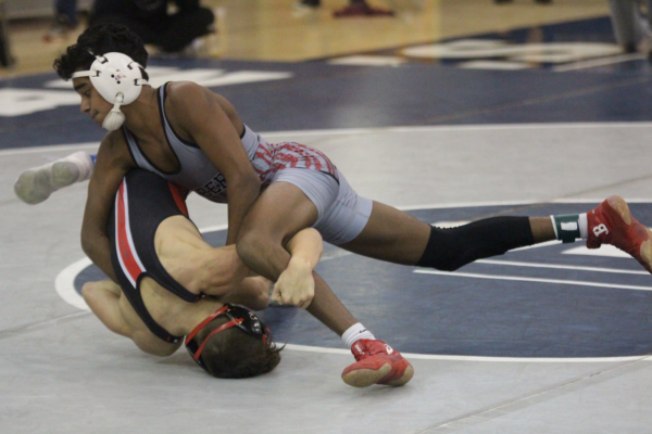 Lambert wrestler Sri Dhanabalan competes in the Region tournament, Jan. 2023(Photo by Nicholas Sullivan)