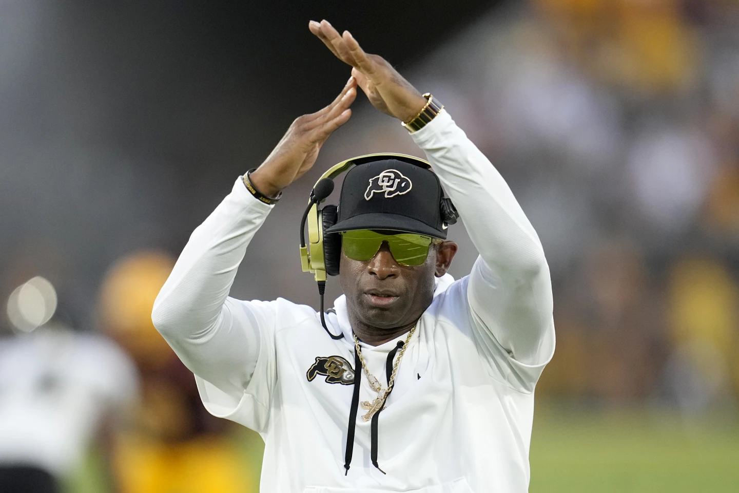 Colorado head coach Deion Sanders on the field during his team’s game against Arizona State. Photo taken from Associated Press.