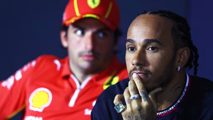 Lewis Hamilton (right) sitting next to Ferrari driver Carlos Sainz (left) who Hamilton will replace in the 2025 Formula One season (Getty Images/2023)