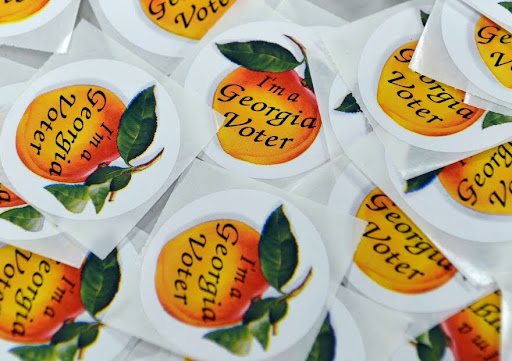 Stickers were given to Georgia voters at the Georgia Voting Polls. Courtesy of Brant Sanderlin Via AJC. 