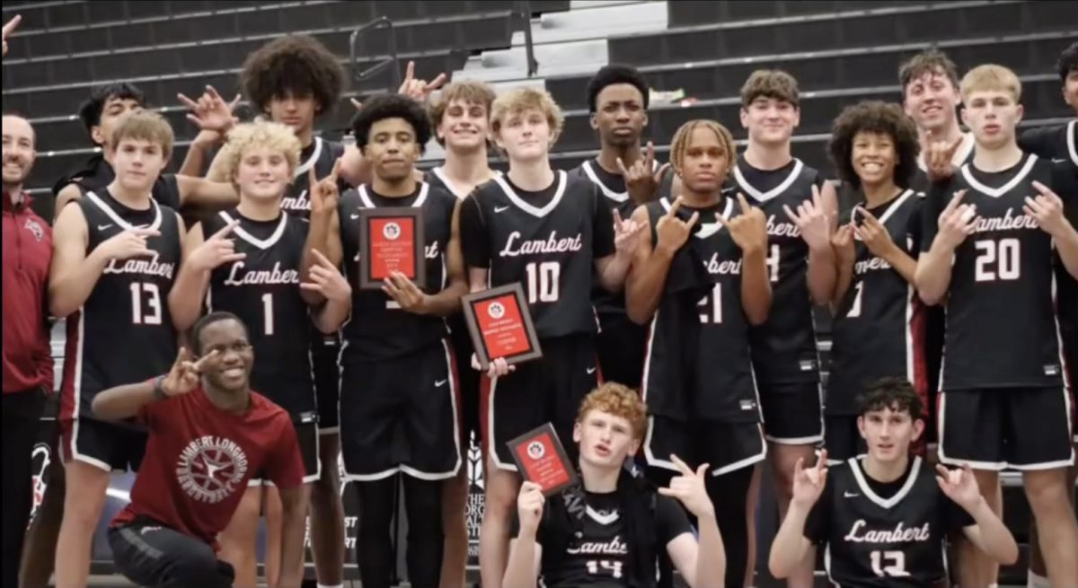 Lamberts mens basketball team poses for a picture holding awards (Instagram/The Lambert Post)