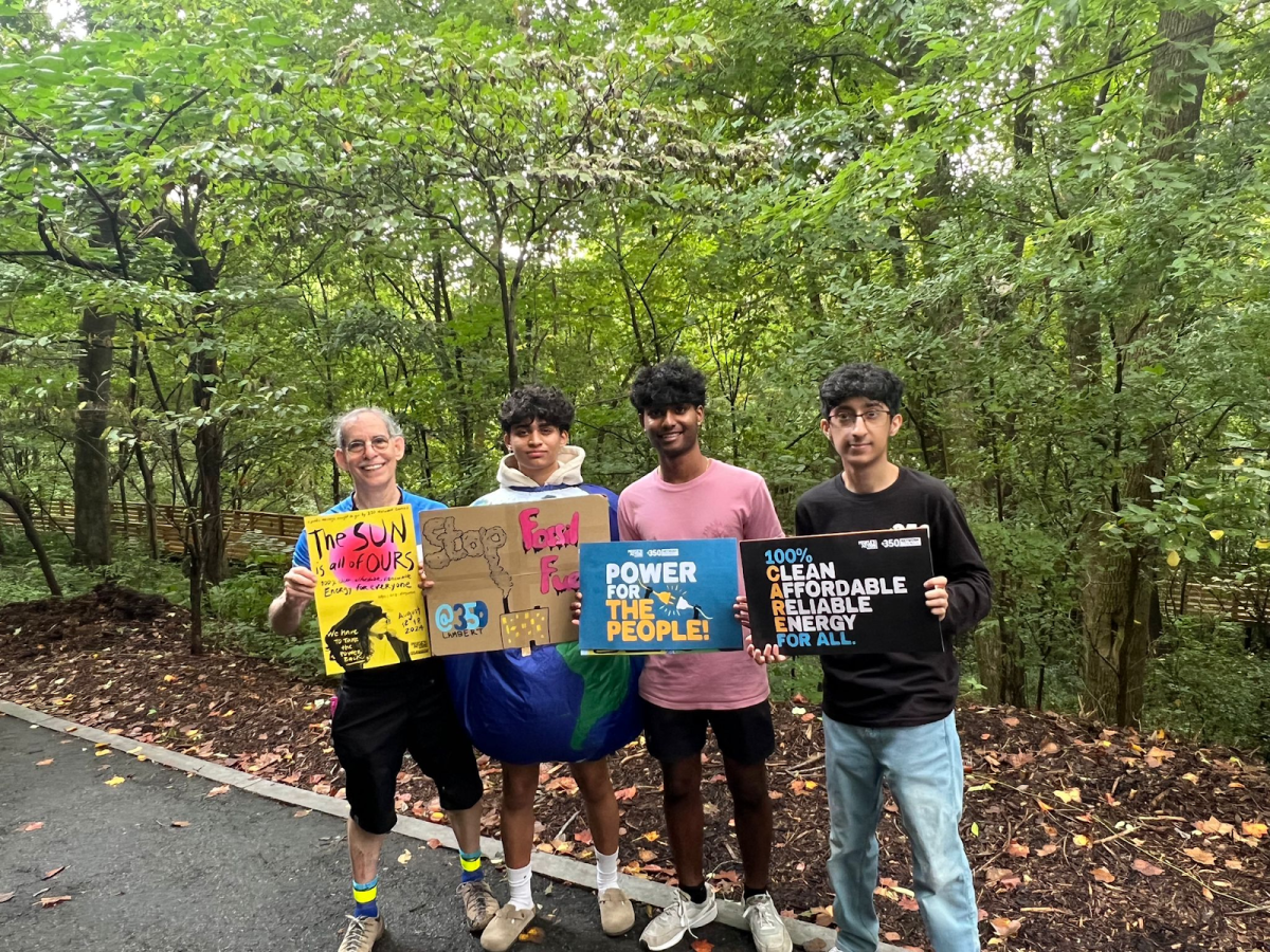 Members of 350 Lambert participate in a protest against the use of fossil fuels by large companies. (Courtesy of 350 Lambert)